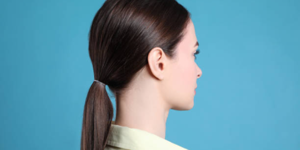 slicked-back ponytail with short hair